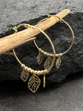 Ohrringe "Creolen verspielt" · 585 Gold · Gelbgold · Blattmuster